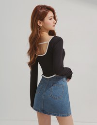 Contrasting Color Back Hollow Long Sleeved Top